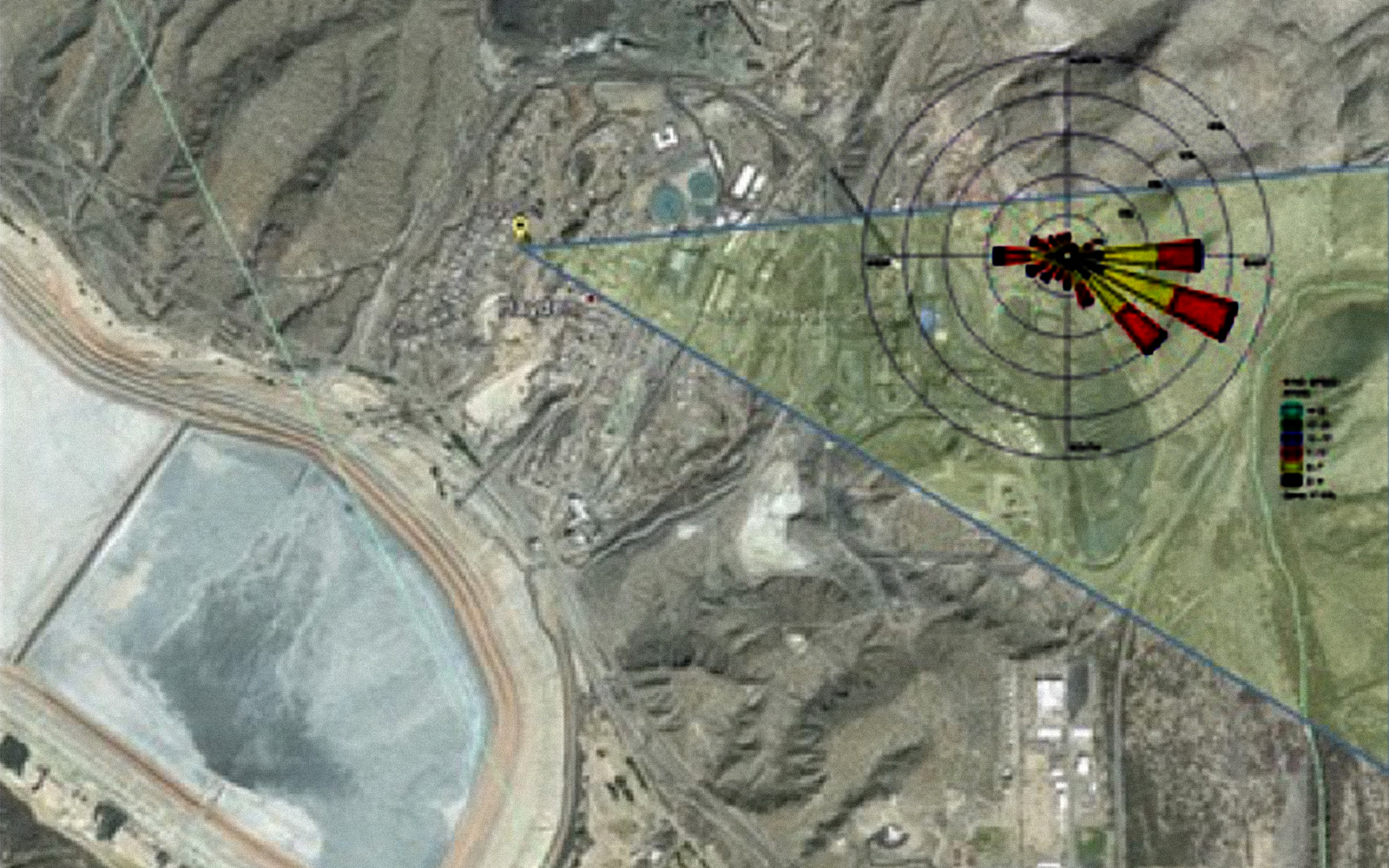 Example output of innovative risk-based method to identify facilities whose emissions may be exceeding permit limits. Output shows satellite view of an area overlaid with windrose showing pollution emissions from a point source.