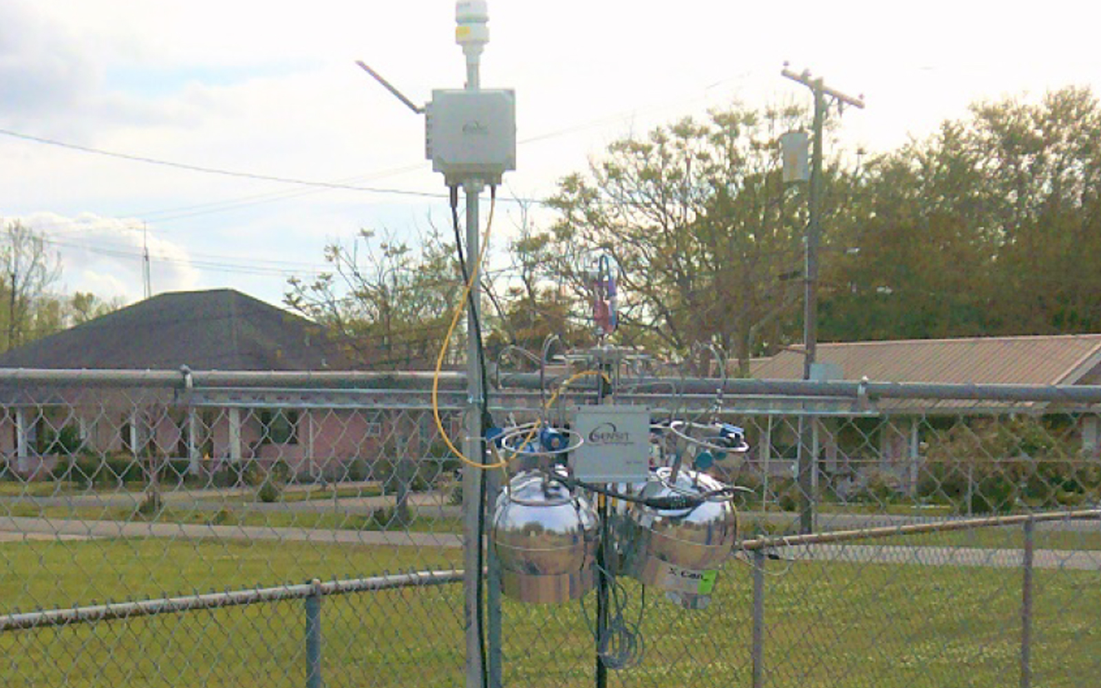 Remote monitoring equipment deployed by ERG near a local elementary school to assess potential exposure