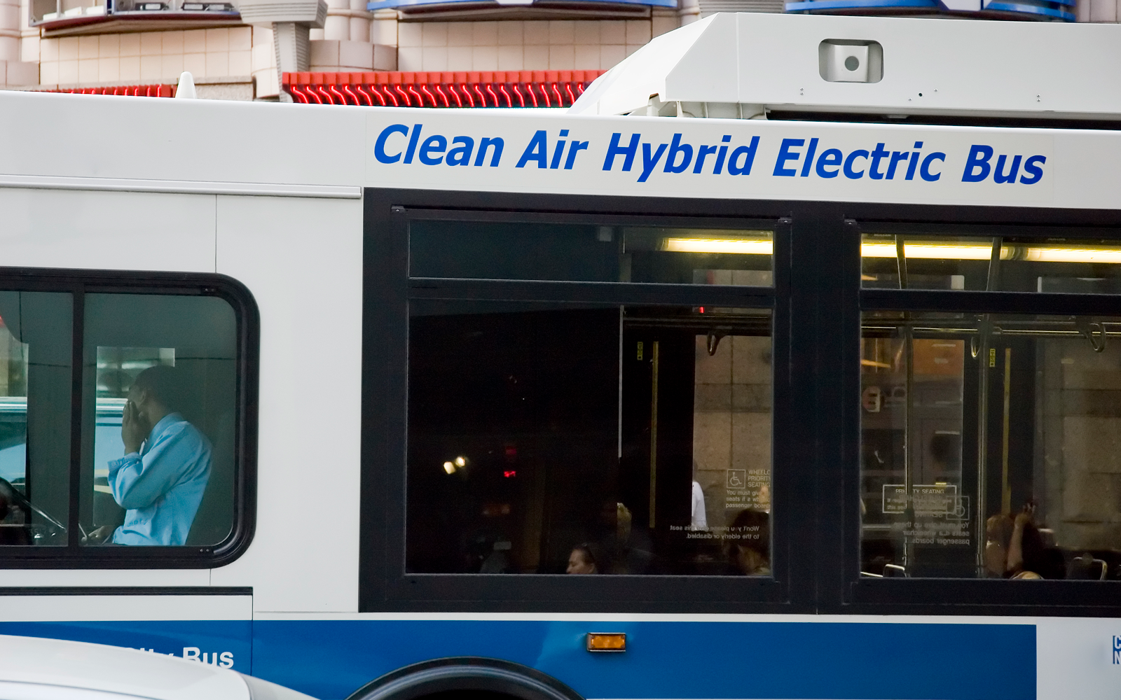 Clean air hybrid electric bus from the side. 
