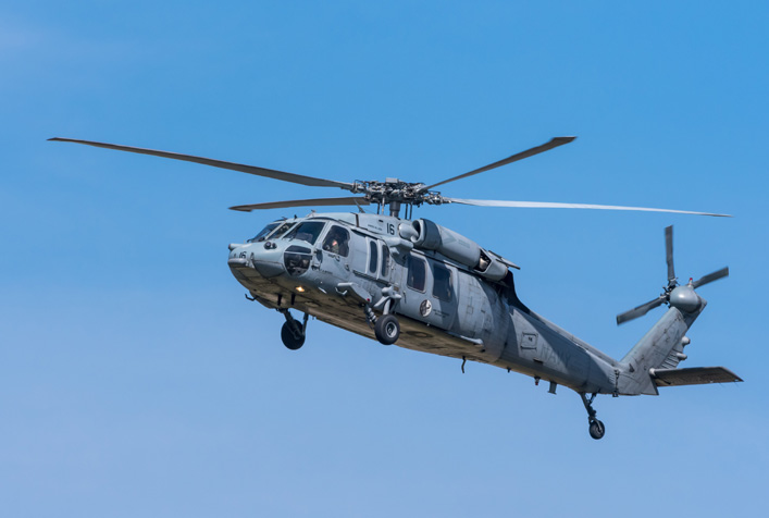Photo of U.S. Navy military helicopter in the sky