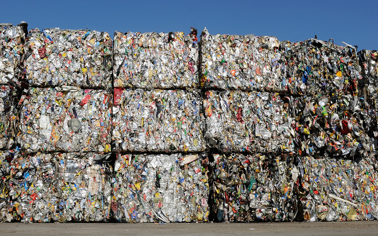 Large stacked bales of compacted trash