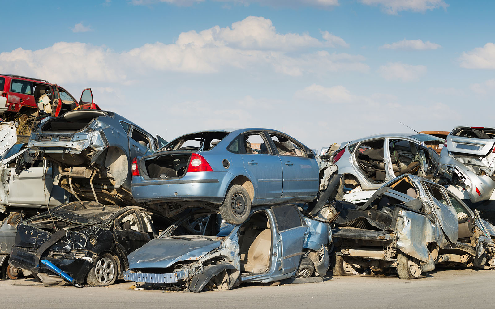 Photo of scrap cars awaiting recycling