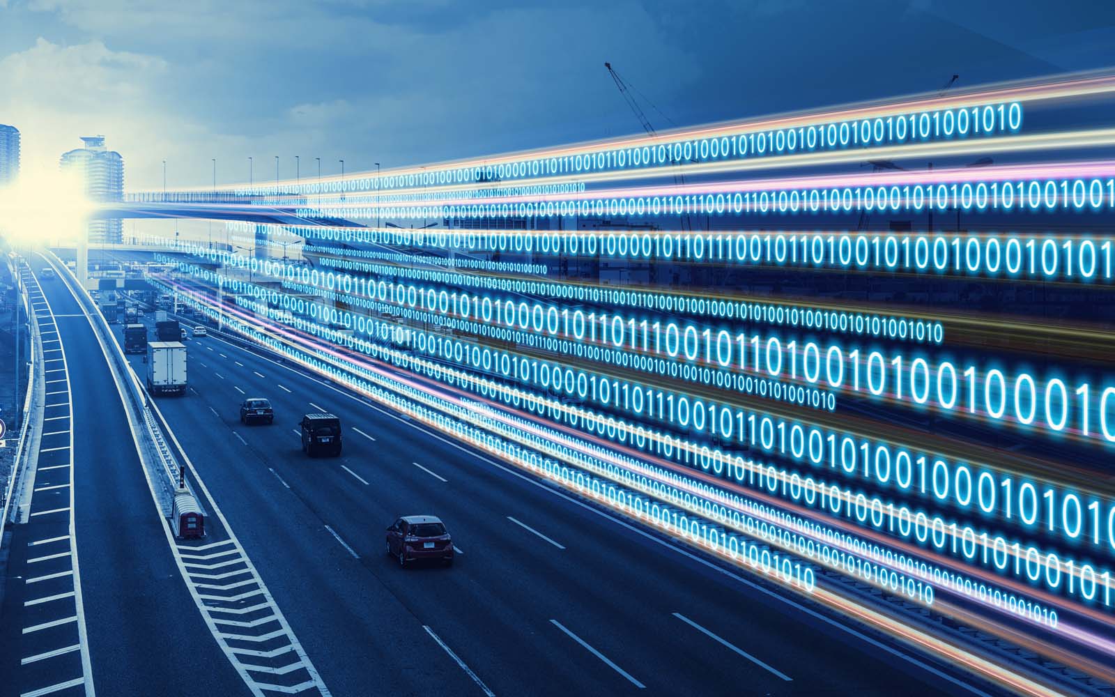 Cars on a highway below a superimposed image of binary code in the sky