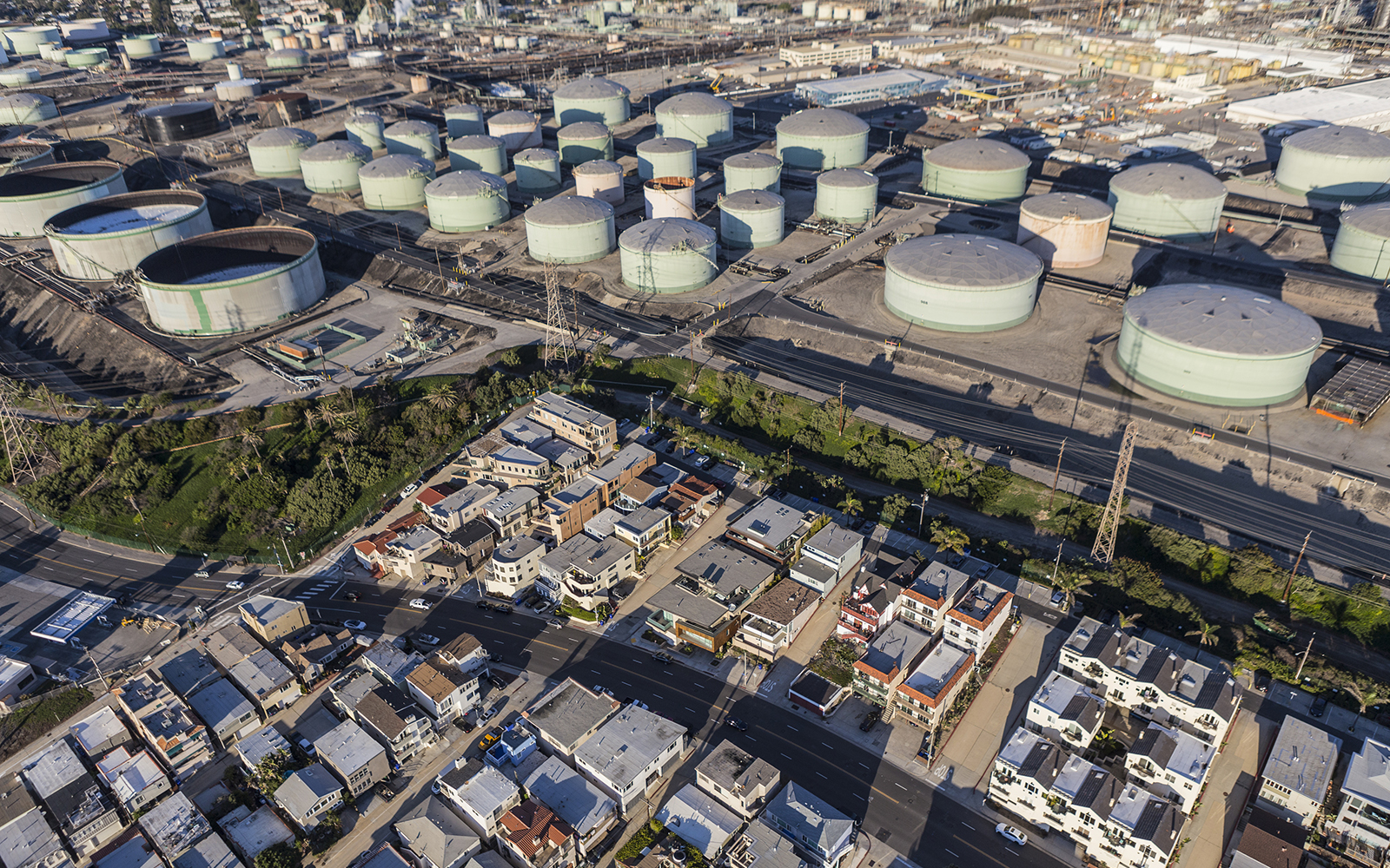 bird's eye view of a cluster of buildings and water towers