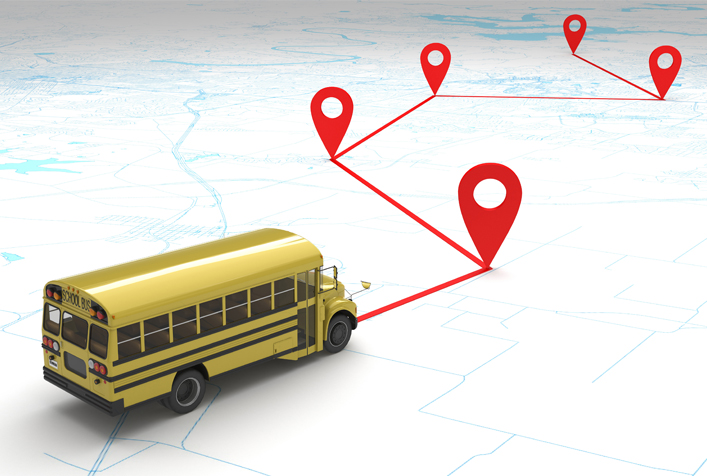 photo of school bus with pin points on a map