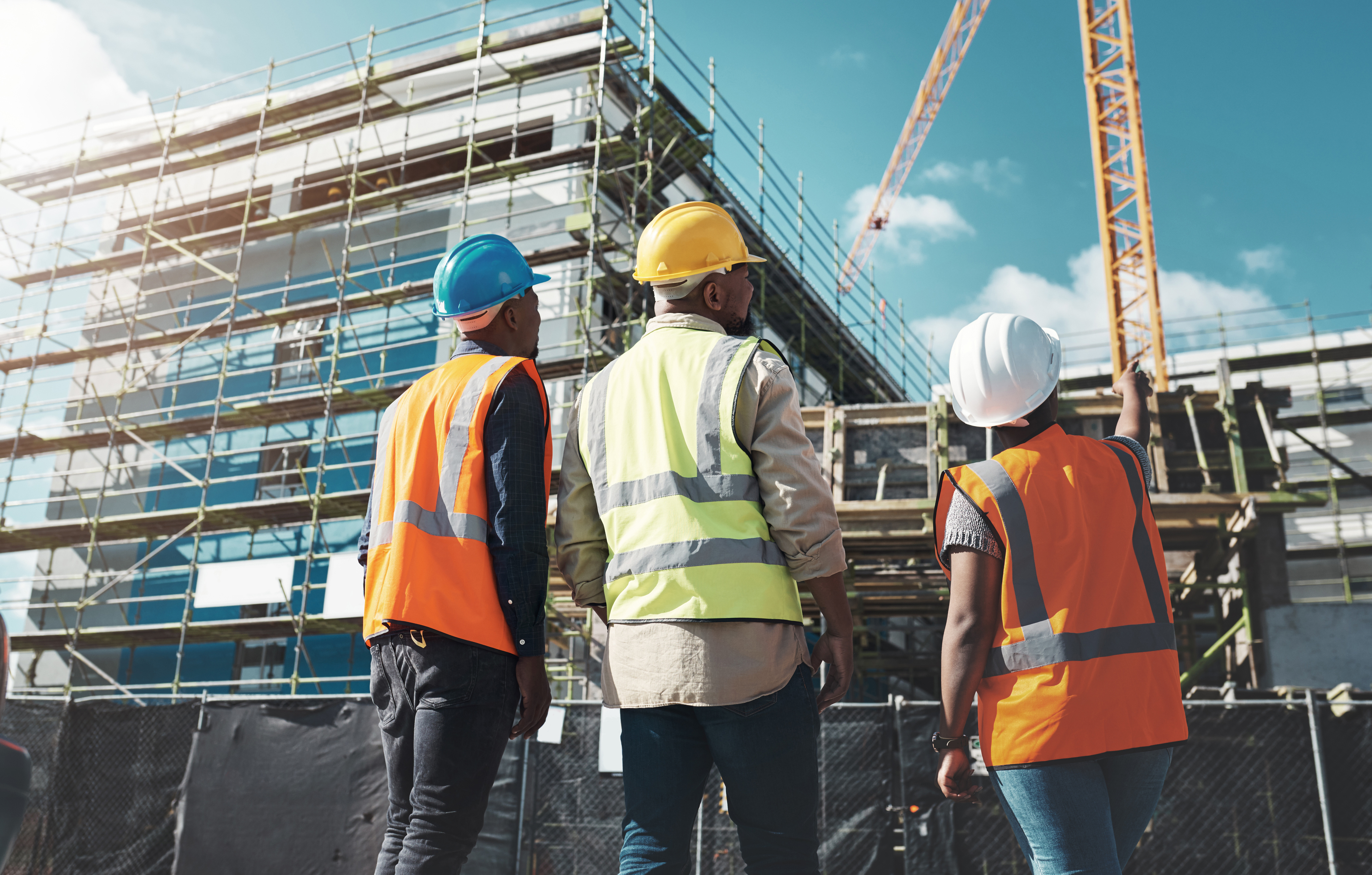 Construction workers viewing plans