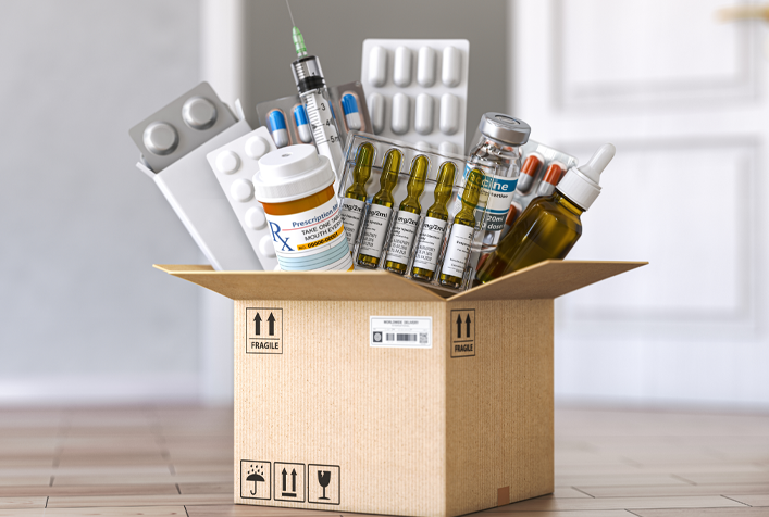 Photo of cardboard box with various drugs displayed