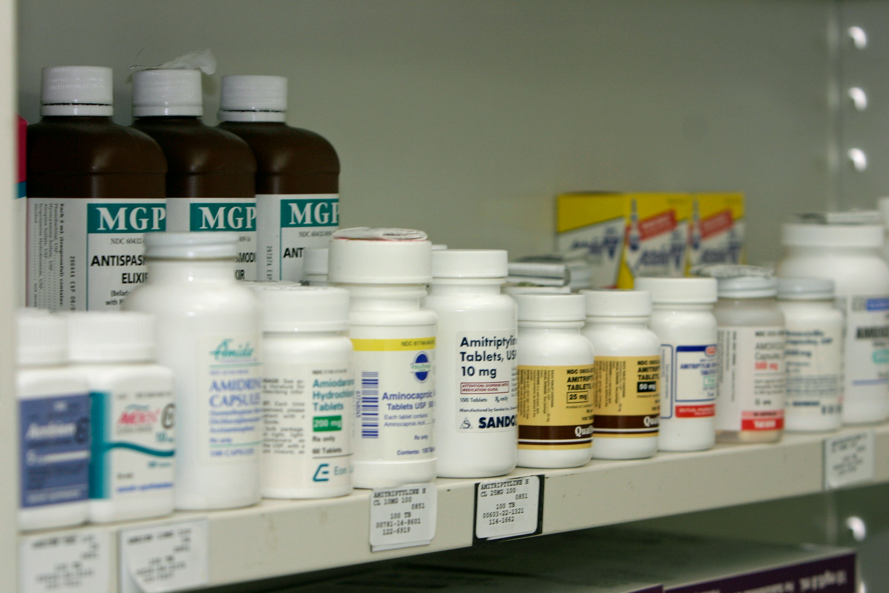 Prescription drugs sit on a shelf