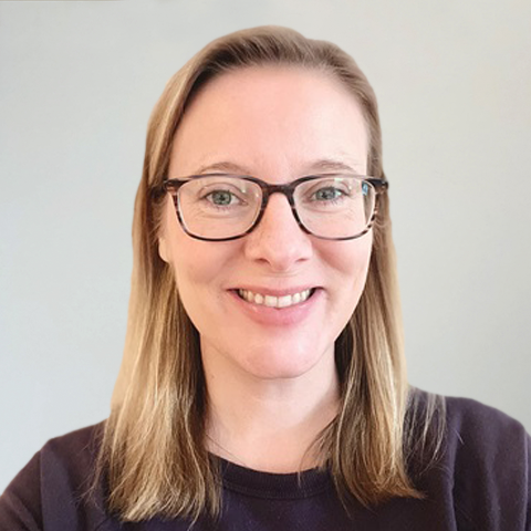 Photo of the face of Rebecca DeVries.